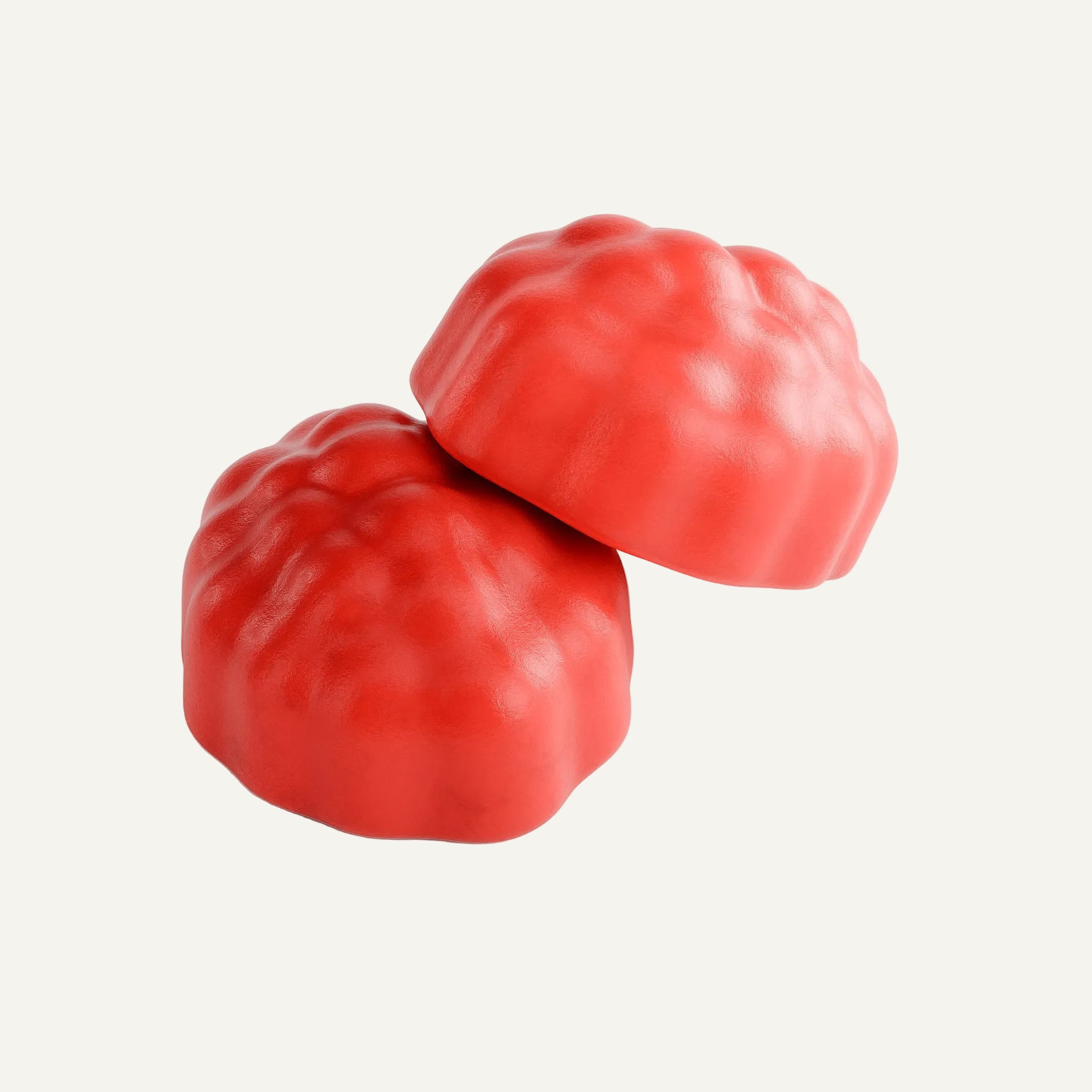 Two red gummy candies on a white background